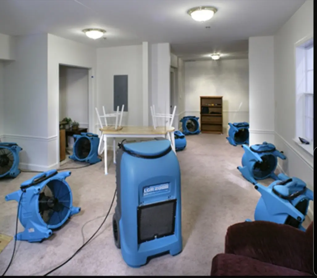 Air movers and dehumidifier setup for Water Damage Restoration in Ferndale